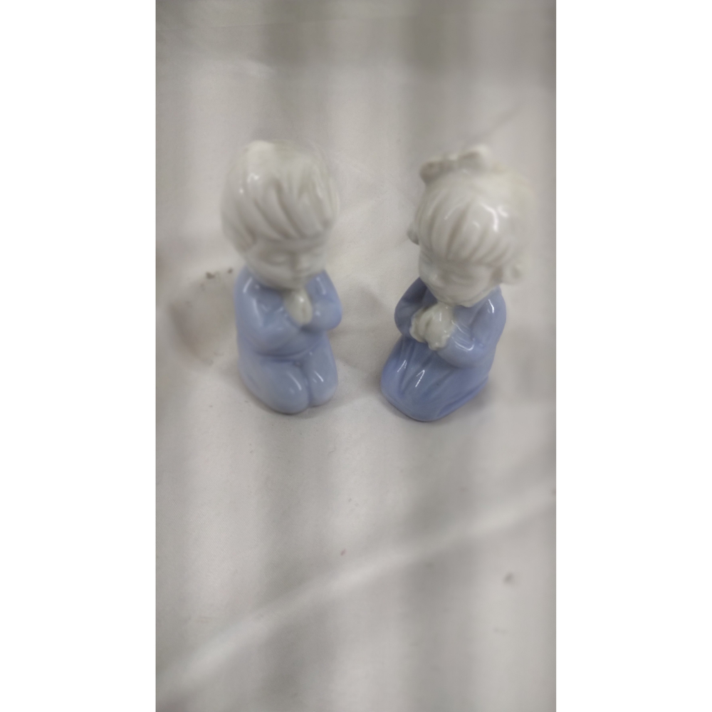 2 vintage boy and girl kneeling and praying